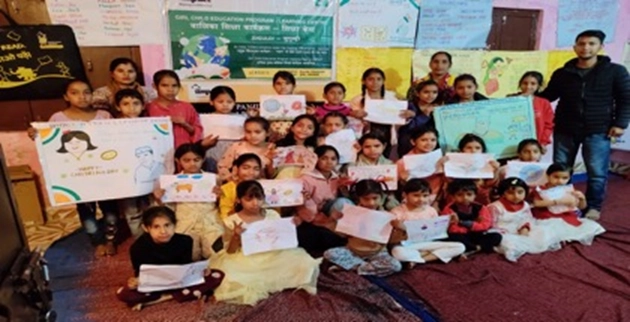 Girls participating in a Bal Sabha event, confidently presenting their artwork